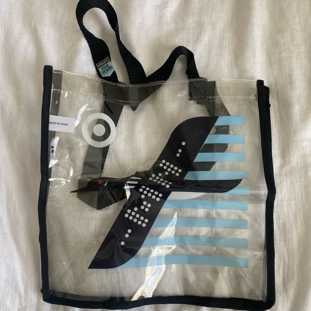 OBO Minnesota United FC clear tote bag with 5 Year pin